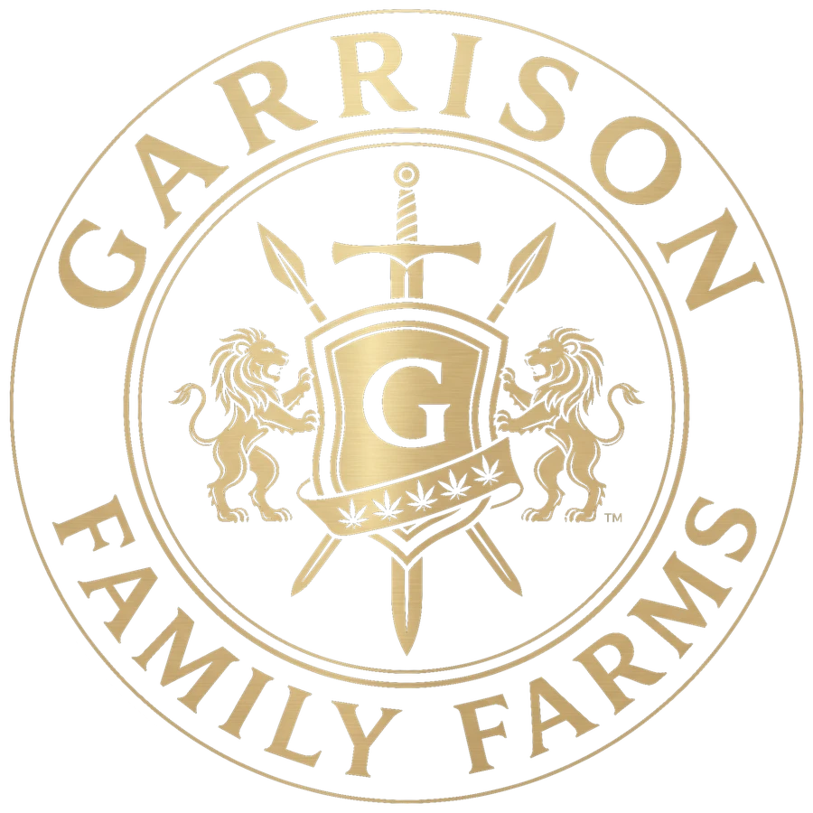 Garrison Family Farms seal: two lions holding a shield marked G, with a banner of hemp leaves